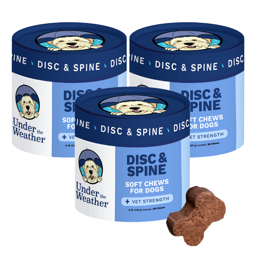 Three containers of 'Under the Weather' dog spine and disc health supplements with several chews in front.